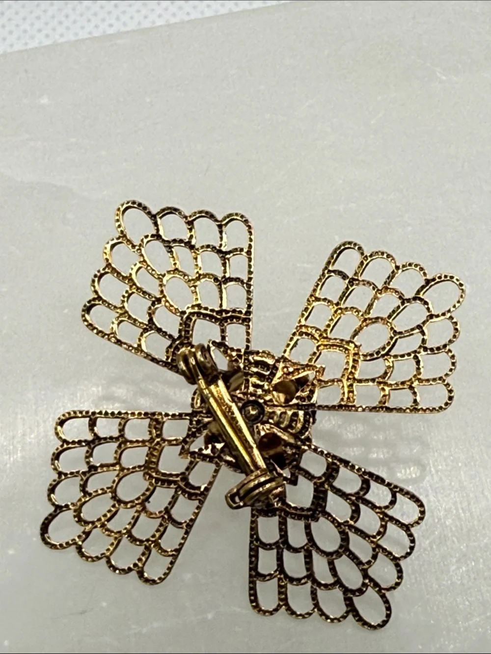 Gold Filigree Floral Brooch with Clear Crystal Center